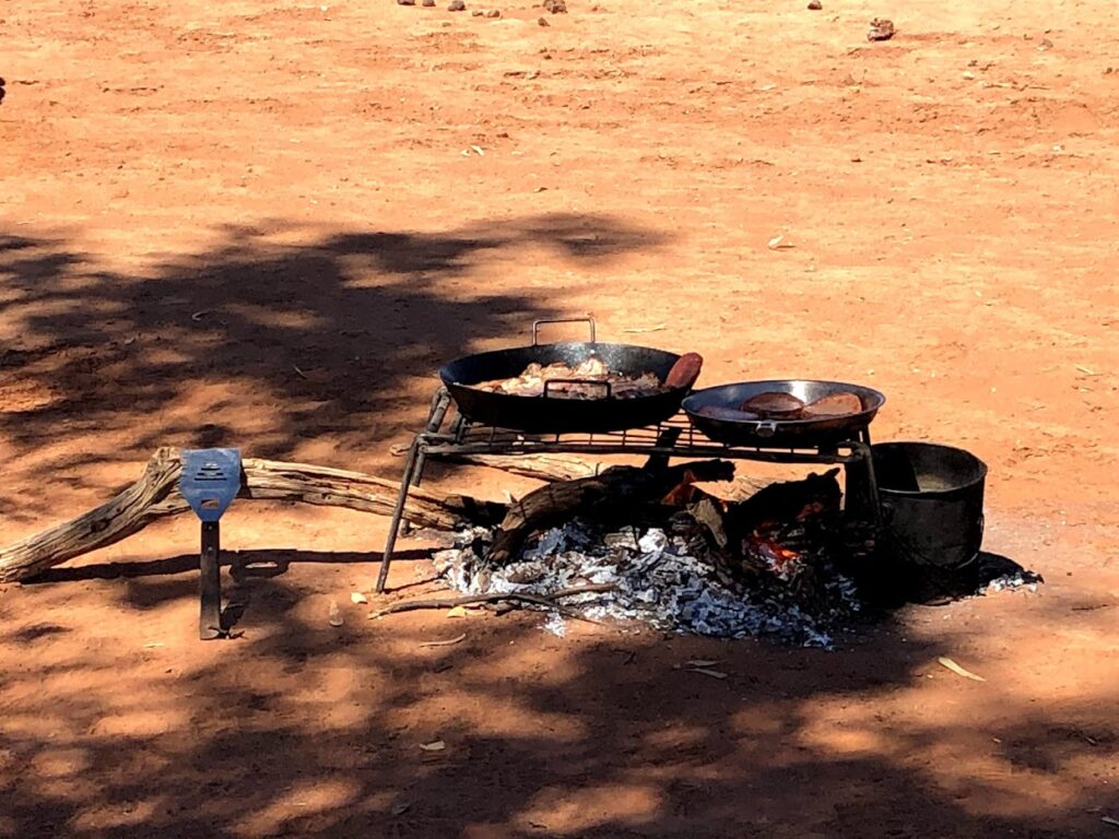 Lunch cooking over coals near the yards at Todd River Downs NT
