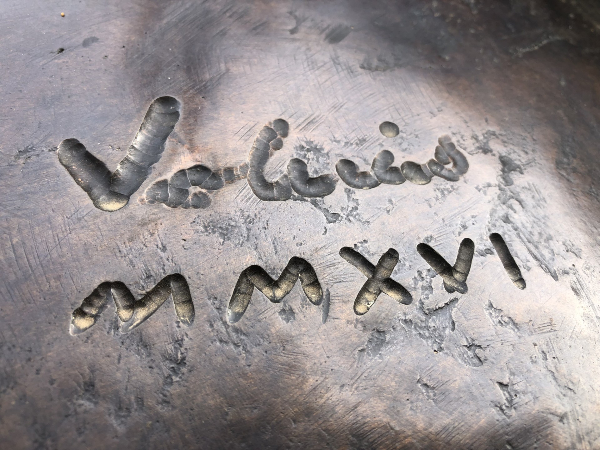 Sculptor Carl Valerius' signature on his life-size sculpture of Bill the Bastard at Harden