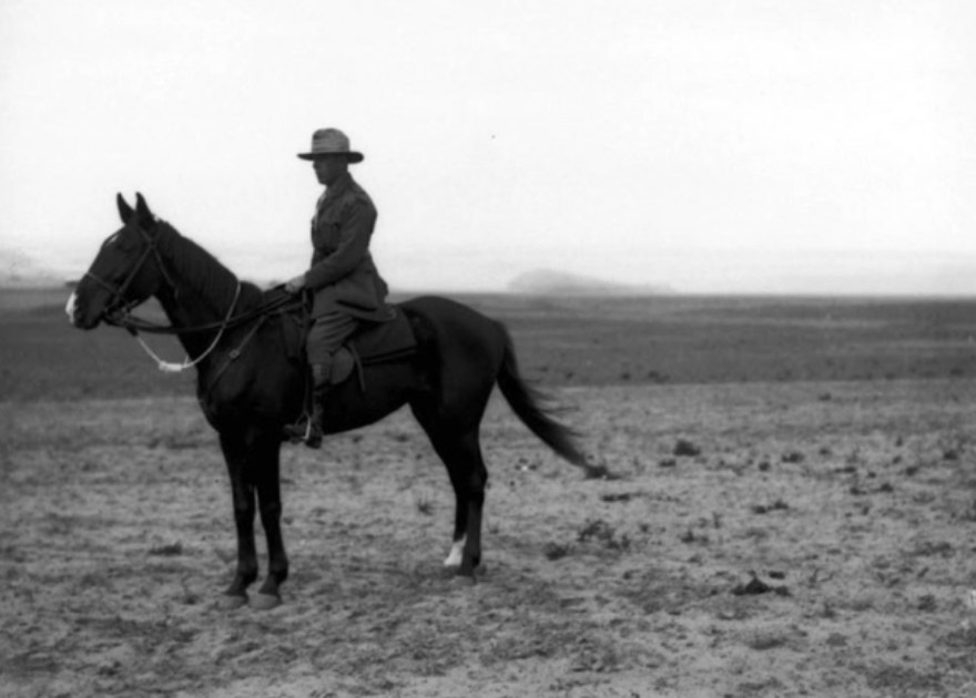 Informal portrait of Lieutenant K C Fraser, 2nd Australian Light Horse Machine Gun Squadron on his mount, Egypt 1919