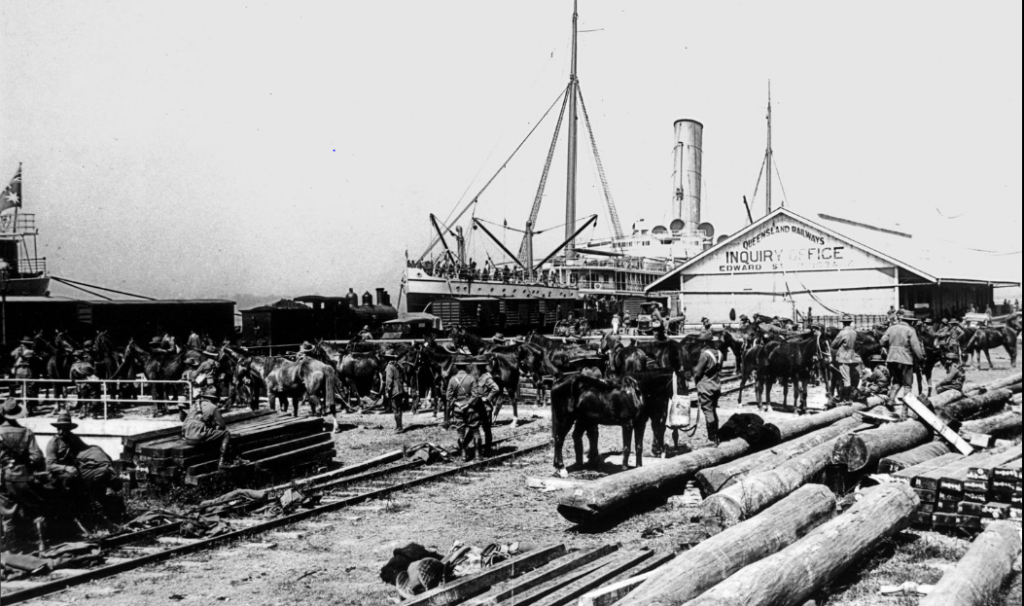 'Soldiers waiting to board the Omrah (ship) at the Pinkenba Wharf, Brisbane, 1914.'