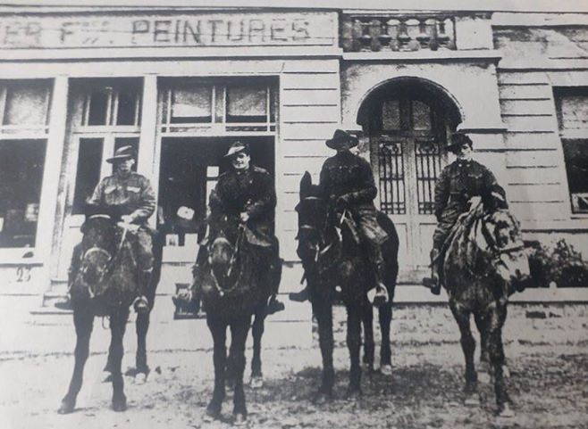 Frederick William Jury. 8th Light Horse.
Second from right/ third from left.

Rode into a town in France for supplies, WW1; bought from the shop behind them.

Nik Nak (facebook name) family photos.