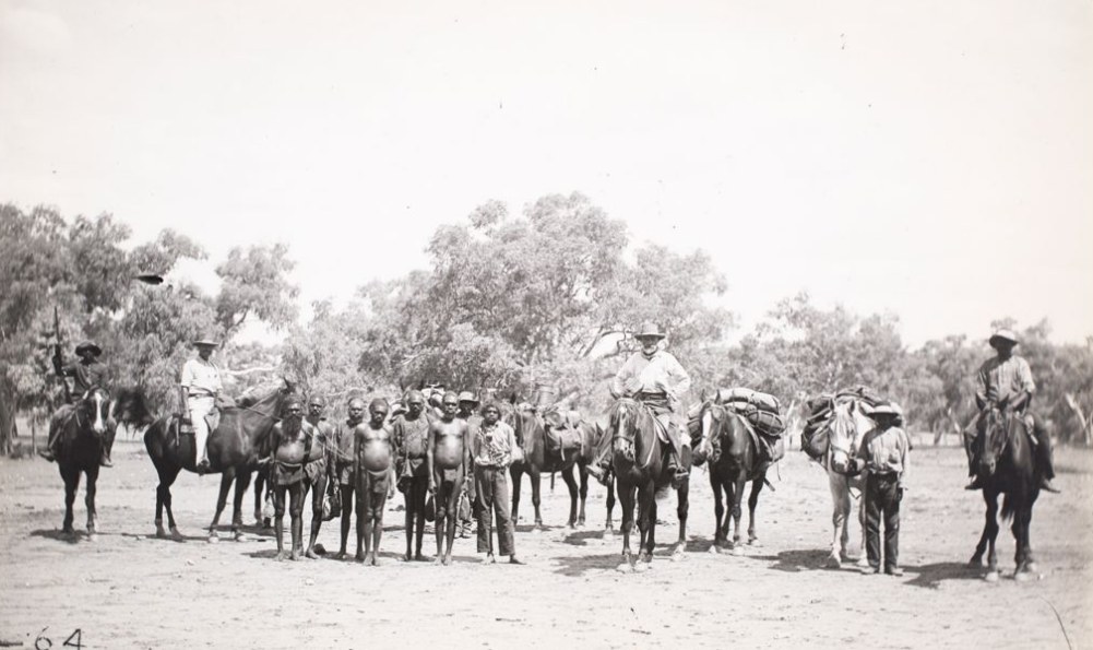 Mounted constables left to right, ?, French, Brookes, ?, ?, with aboriginal prisoners, Heavitree police camp.' Territory Stories. These police also hunted Patrick Lenny for trespassing with horses. The police of several stations such as Daley River had horses remarkably like Patricks.