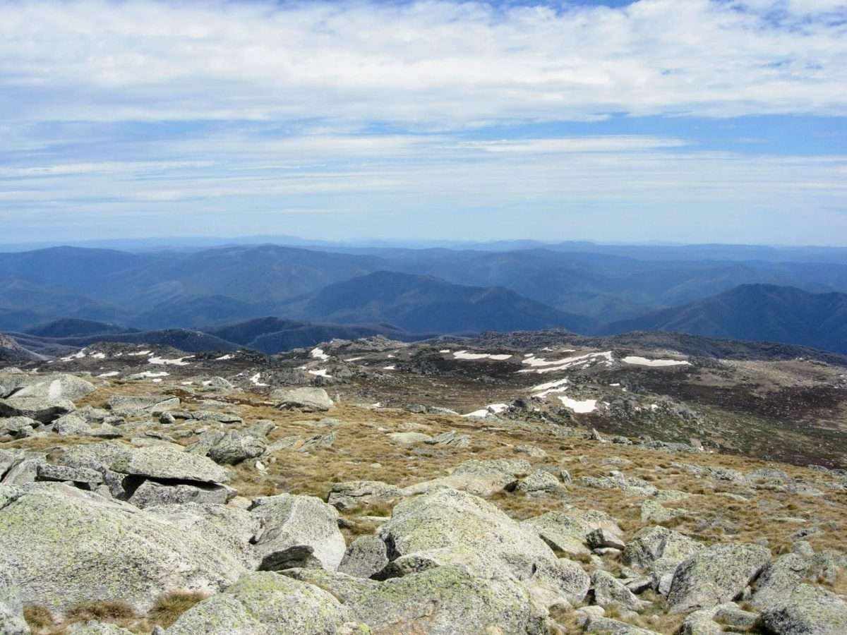 View from the summit over the Snowy mountains to the west. Mt Kosciuszko Summit Walk, image from hikingscenery.com