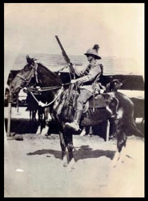 Photo from personal collection of Trish Woodyard's grandrather mounted on a horse