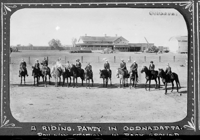 'A riding party at Oodnadatta, the railway station is in the background. c. 1912.' State Library S.A.