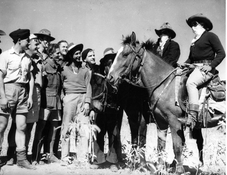 Sisters Edna and Kathleen Zigenbine droving 1,400 head of cattle from Bedford Downs station in the Hall's Creek area of Western Australia, across the Northern Territory to Dajarra, Queensland. 1943 State Library of Victoria