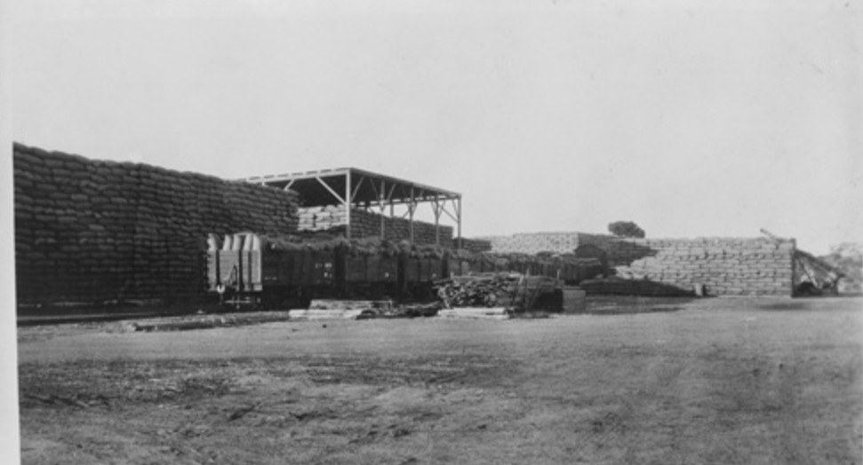 State Library of Western Australia. stored bulk wheat one part is covered...having it in bulk is understandable as we were producing such vast quantities.