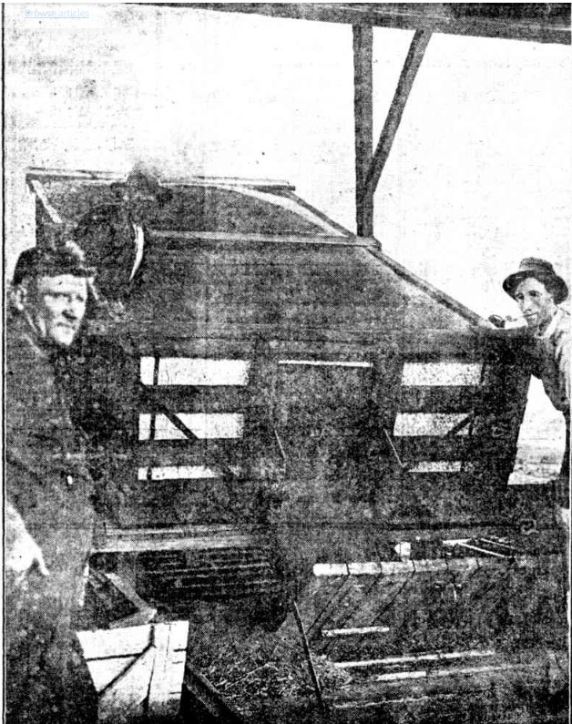 'Unloading the bulk grain. End view of the wagon with the wheat running out of the wagon into the hopper.' Observer, 17th February 1923