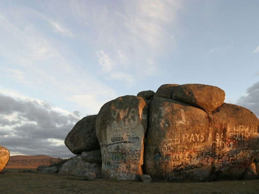 Tripadvisor photo, AussiePD.

Thunderbolt's Rock. Beside the New England Highway. It has been graffitied for over a century.