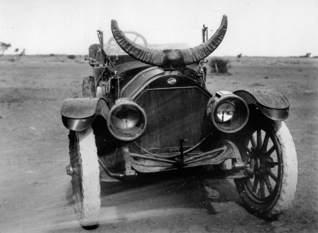'Overland in the outback, possibly Hughenden area, ca. 1915. An Overland manufactured by Willys-Overland, approximate age of the car 1910-1912 equipped with acetylene headlights, pneumatic tyres with patterned tread.' State Library Qld Perdriau tyres achieved fame on these vehicles. The Willey's Overland was an American make although the body was often made here