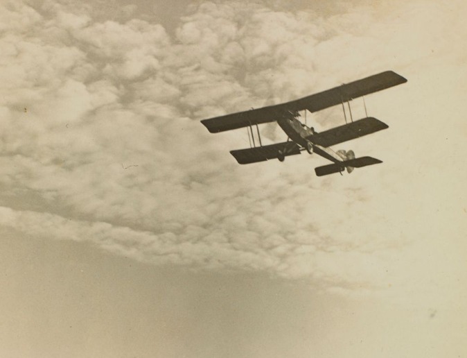 'Perdriau biplane flying over the Brisbane River, Queensland, 1920. The biplane belonged to the Perdriau Rubber Company of Sydney which was involved in experimental flights. The plane was piloted by Lieutenant Butler. This was the first direct flight from Sydney to Brisbane, and took 7 hours, 29 minutes.' State Library Qld.