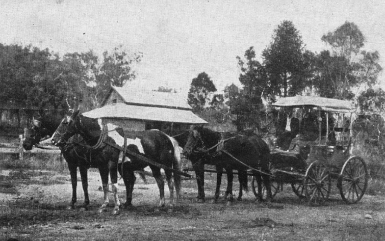 'Half-way house on the coach route between Kannangur (outside Toogoolawah) and Nanango. Formerly a station homestead, it was afterwards an hotel, and is now again a simple homestead. The photograph shows the coach* stopping to pick up the mailbag from Stonehouse in 1910.' Photo by H.E. Harris, Queenslander, 30 April 1910