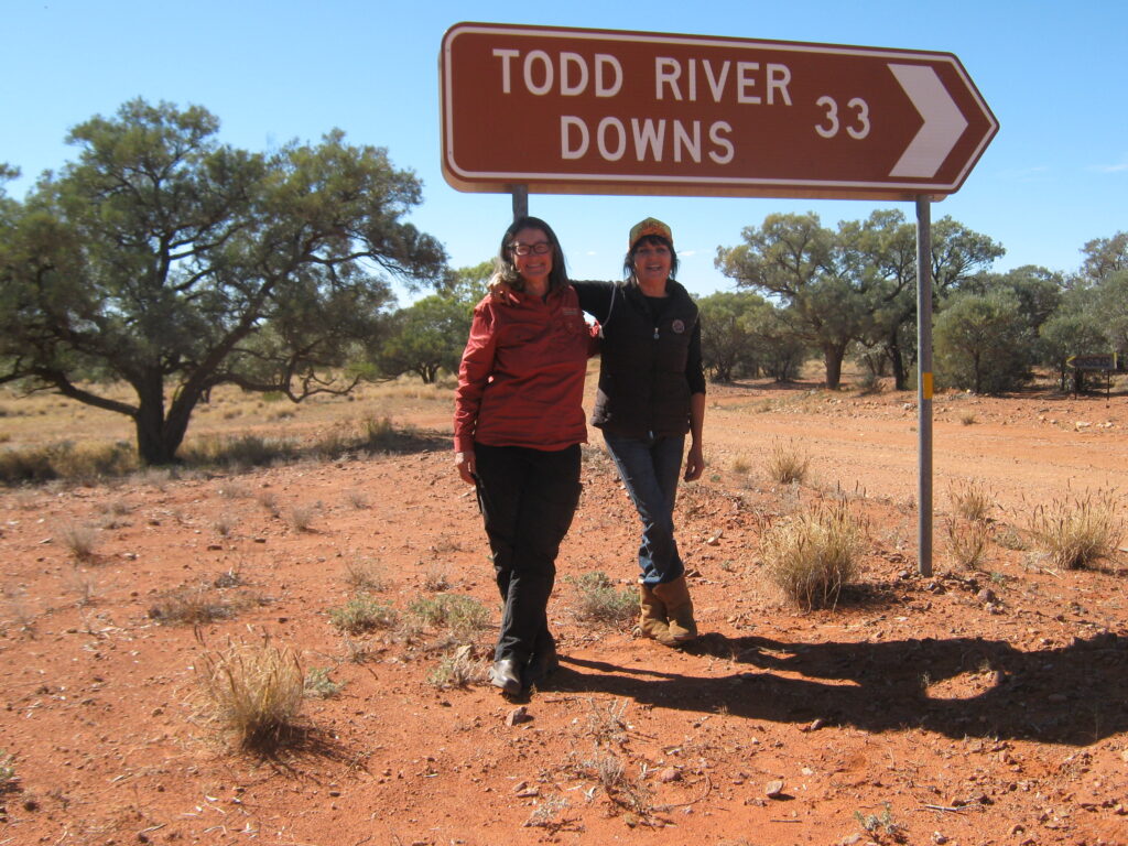 Angela Tiede and Cheryl Schembri at Todd River Downs sign August 2025