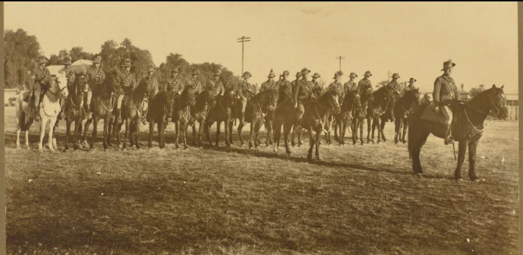 'Warwick Troop: A Squadron, 11th Light Horse Regiment, 1914-1918. In front: Capt. M. V. Williams; Lieut. E. B. Miller. Left to right: Sgt. McIntosh; Tpr. T. Jones; Cpl. Carey; Cpl. Thorn; L.-Cpl. Riemers; Tpr. Brown; Tpr. Bamberry; Sgt. Cook; McLaren; Tpr. Wilkinson; Tpr. Clegg; Cpl. Haines; Tpr. L. S. Miller; Tpr. Meneely; Tpr. Hammond; Tpr. Thorpe; Tpr. E. Baguley; Tpr. Braithwaite; Tpr. Cullen. (Description supplied with photograph.).' State Library Qld