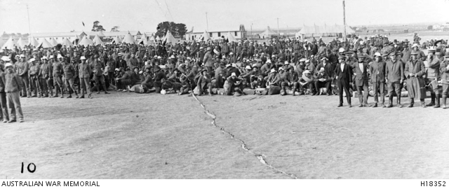 A mixed parade of personnel in the early life of Seymour Army Camp. AWM