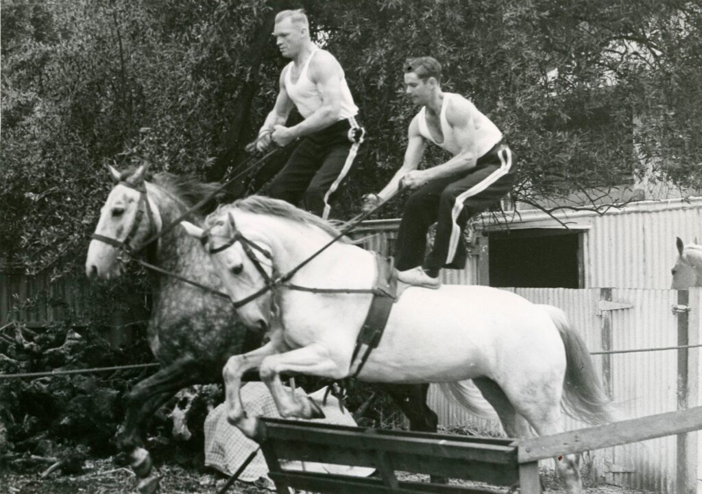 ''Alf Menz and John Heinrich - 1960 - Thebarton Police Barracks sand manege.' From Richard Mails